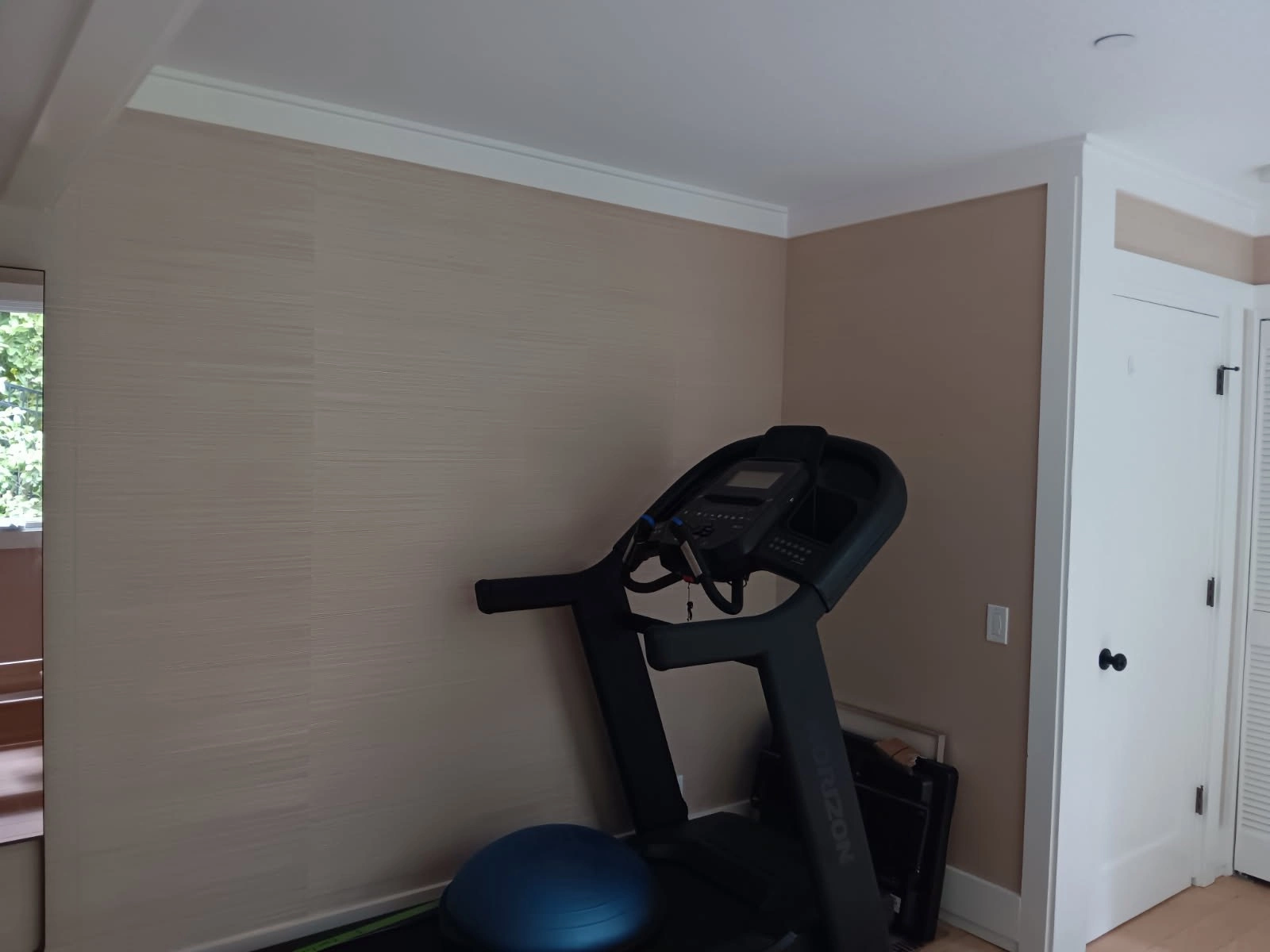 Professional wallpaper removal process protecting drywall underneath in Hollywood, Los Angeles